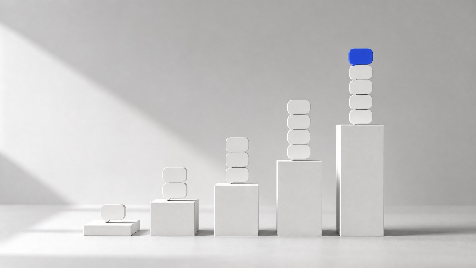 Five white plinths rising like pricing tiers, each holding message tokens, with one cobalt blue message on the tallest